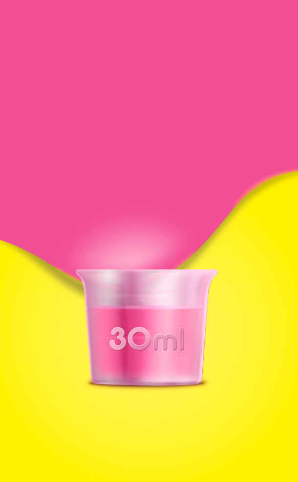 A small, translucent plastic measuring cup filled with pink liquid up to the 30ml mark, centered against a vibrant background of split pink and yellow colors.