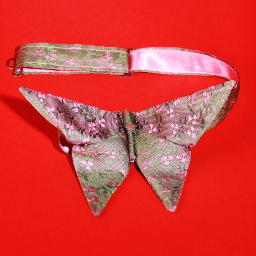 Pink berries bowtie with collar tape visible