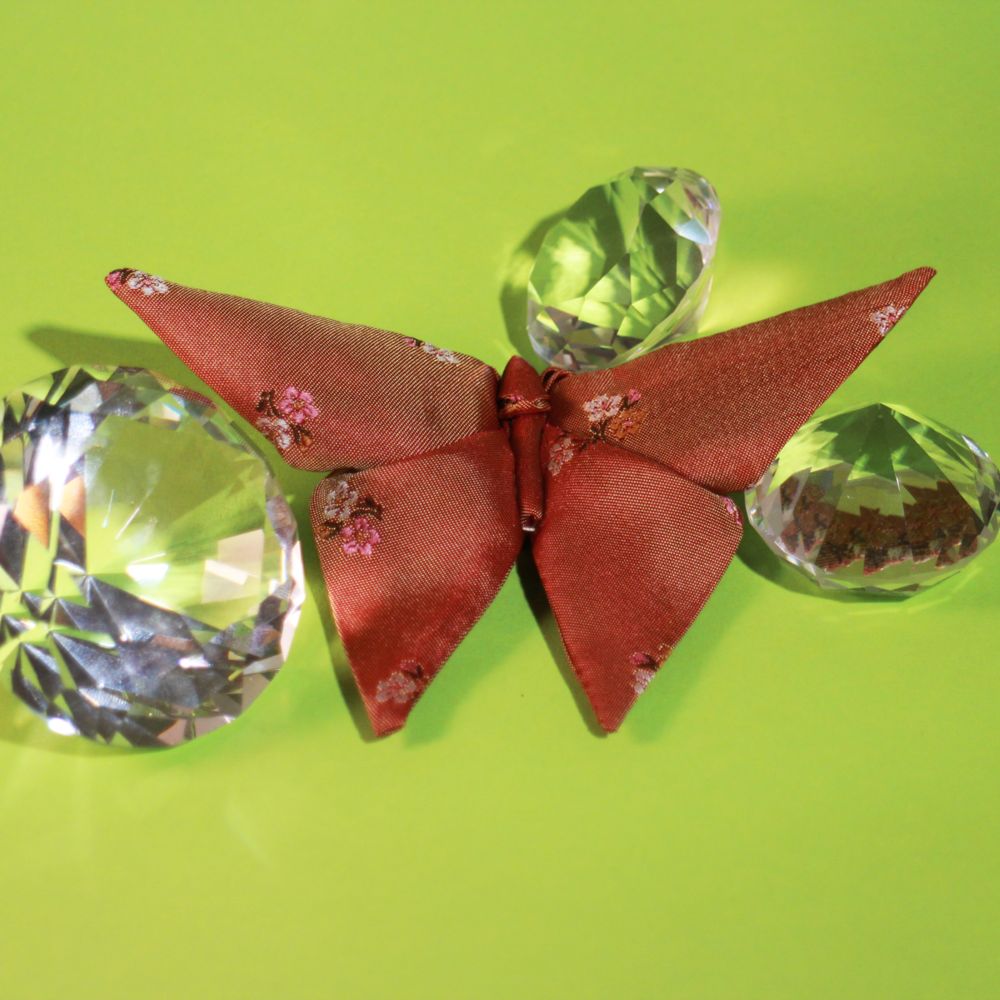 Stylized origami butterfly bow tie with diamonds 