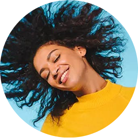 Young woman tossing hair