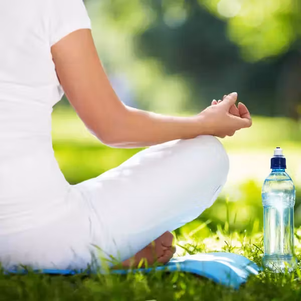 close up of a woman in lotus position