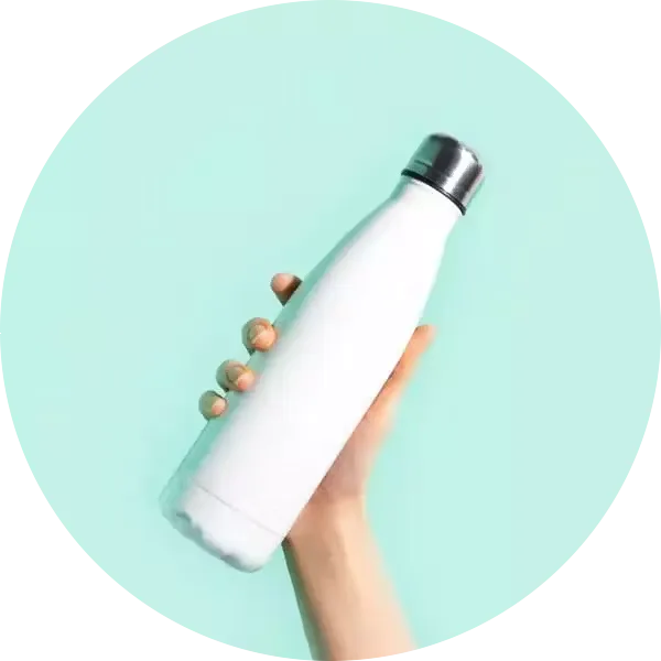 Hand holding water bottle against colorful background