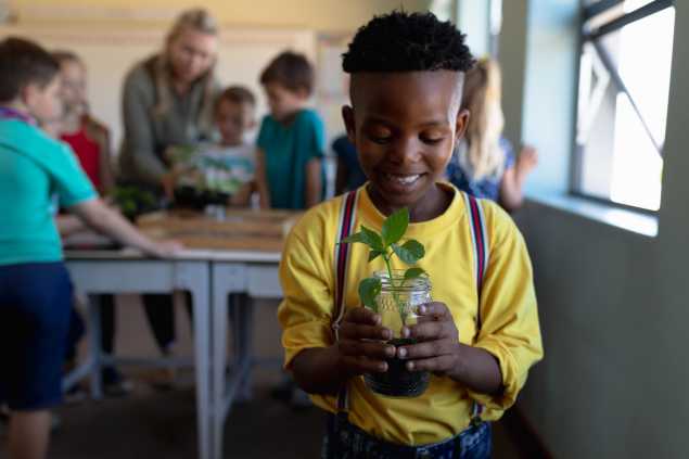 student of color in science class hero image