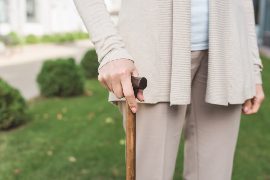 close-up-partial-view-of-senior-woman-holding-walk-2023-11-27-04-54-52-utc.jpg