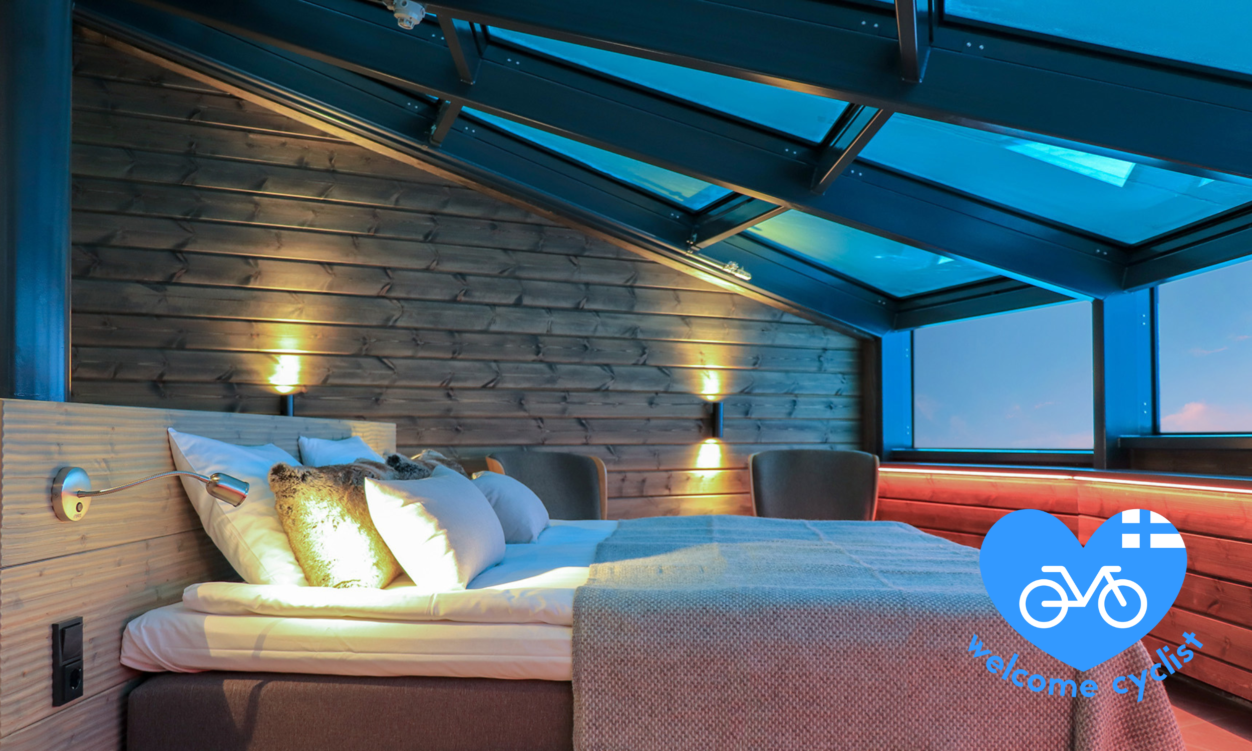 Hotel Levi Panorama pyöräilijäyst logolla