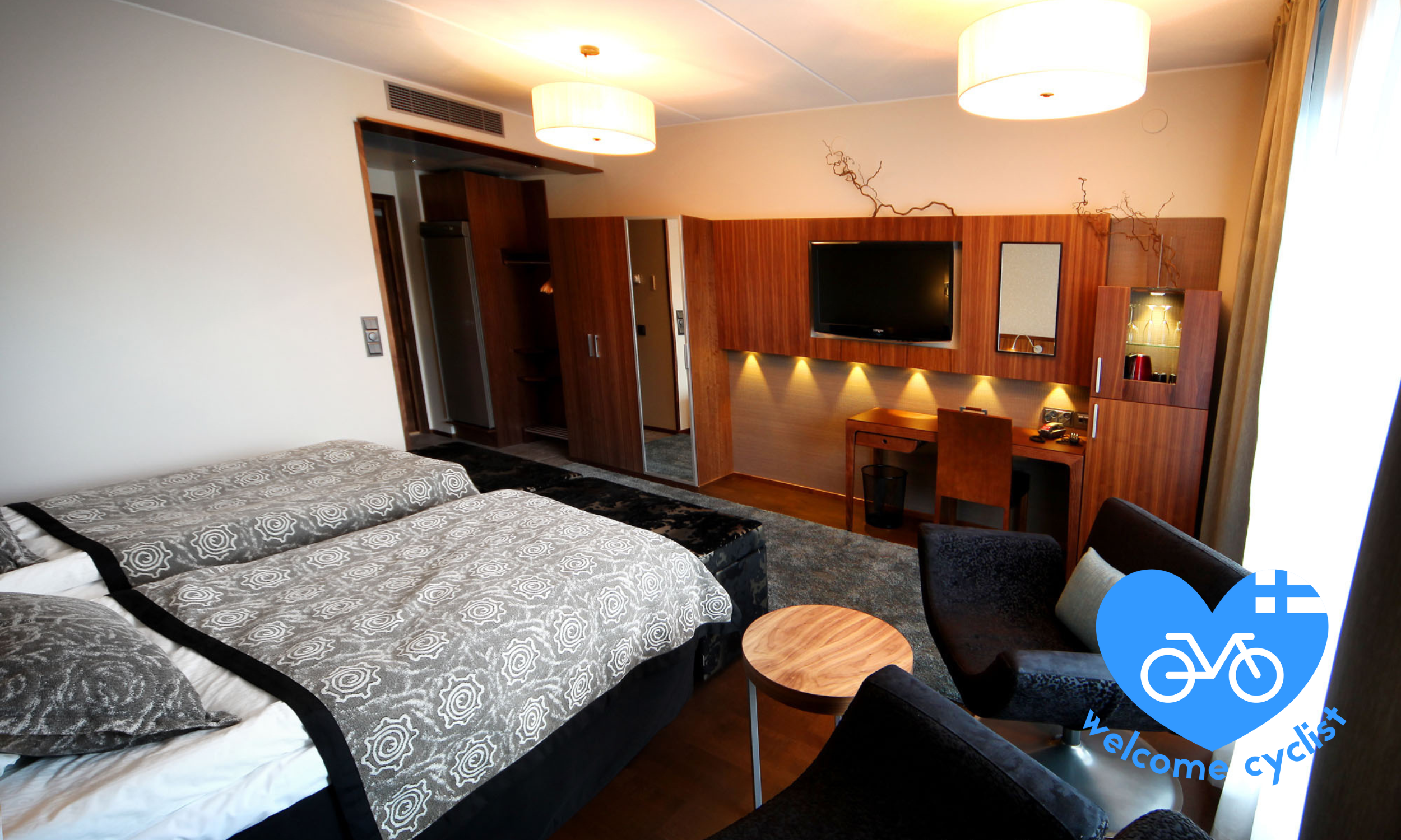 Levi Hotel Spa pyöräilijäyst logolla