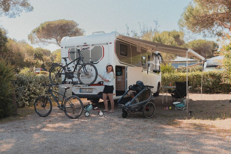 Woman and child camping in Tuscany