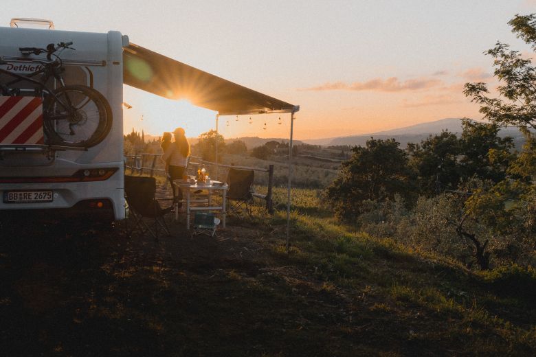 Camping at sunset in Tuscany with the family