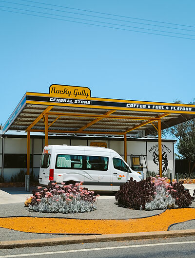 campervan in front of a gas station