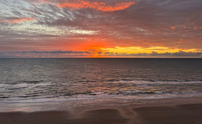 Sonnenuntergang an einem Strand in Dänemark