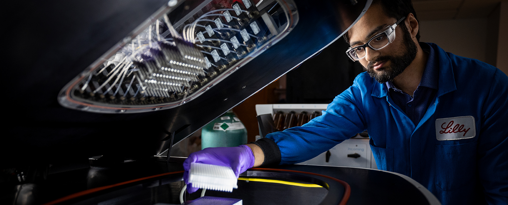 Male Lilly employee working in a research facility. 