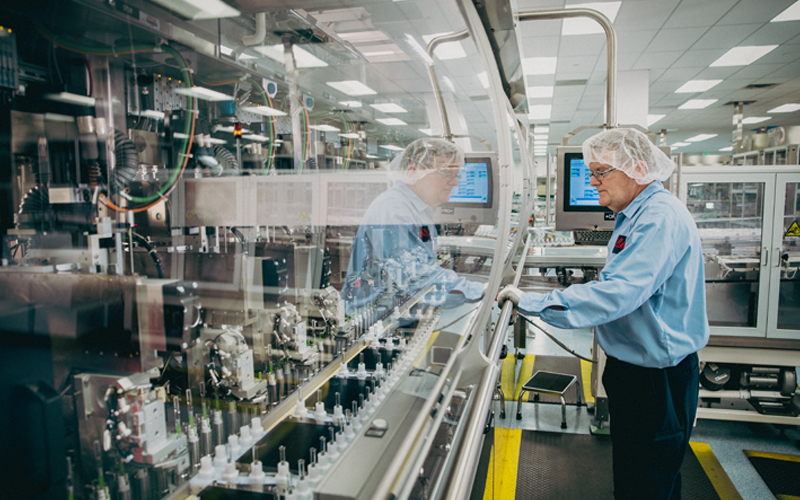 Male working in a manufacturing facility.