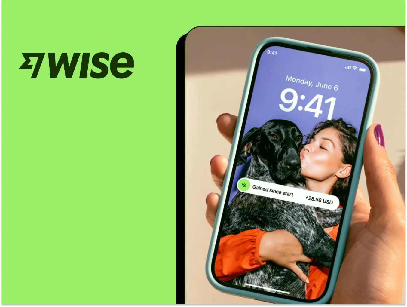 A smartphone screen displaying a lock screen with a photo of a woman kissing a dog. A notification on the screen reads 'Saved since start: +12.80 GBP.' The Wise logo is prominently displayed on the left side of the image against a green background.
