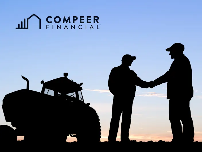 Compeer Financial supports farmers and agricultural businesses with financial services, shown by two farmers shaking hands beside farm equipment