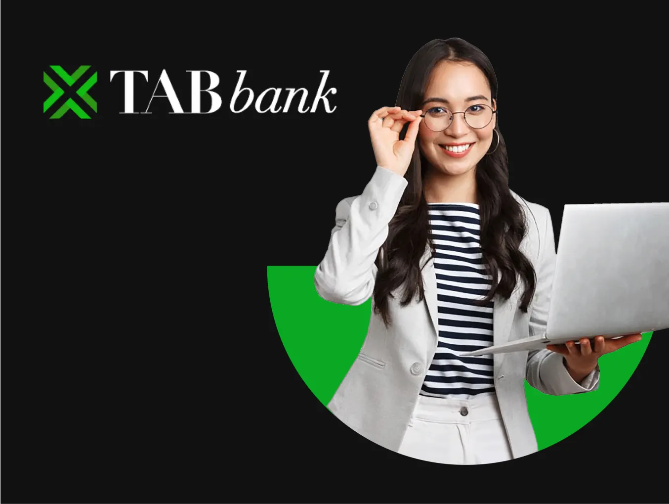 A professional woman, wearing glasses and a light gray blazer over a striped shirt, is smiling and holding a laptop in one hand. She is adjusting her glasses with the other hand. The background is black with a green semicircle behind her, and the TAB Bank logo is displayed prominently in the top left corner. The logo features the name "TAB bank" with a stylized green "X" next to it.