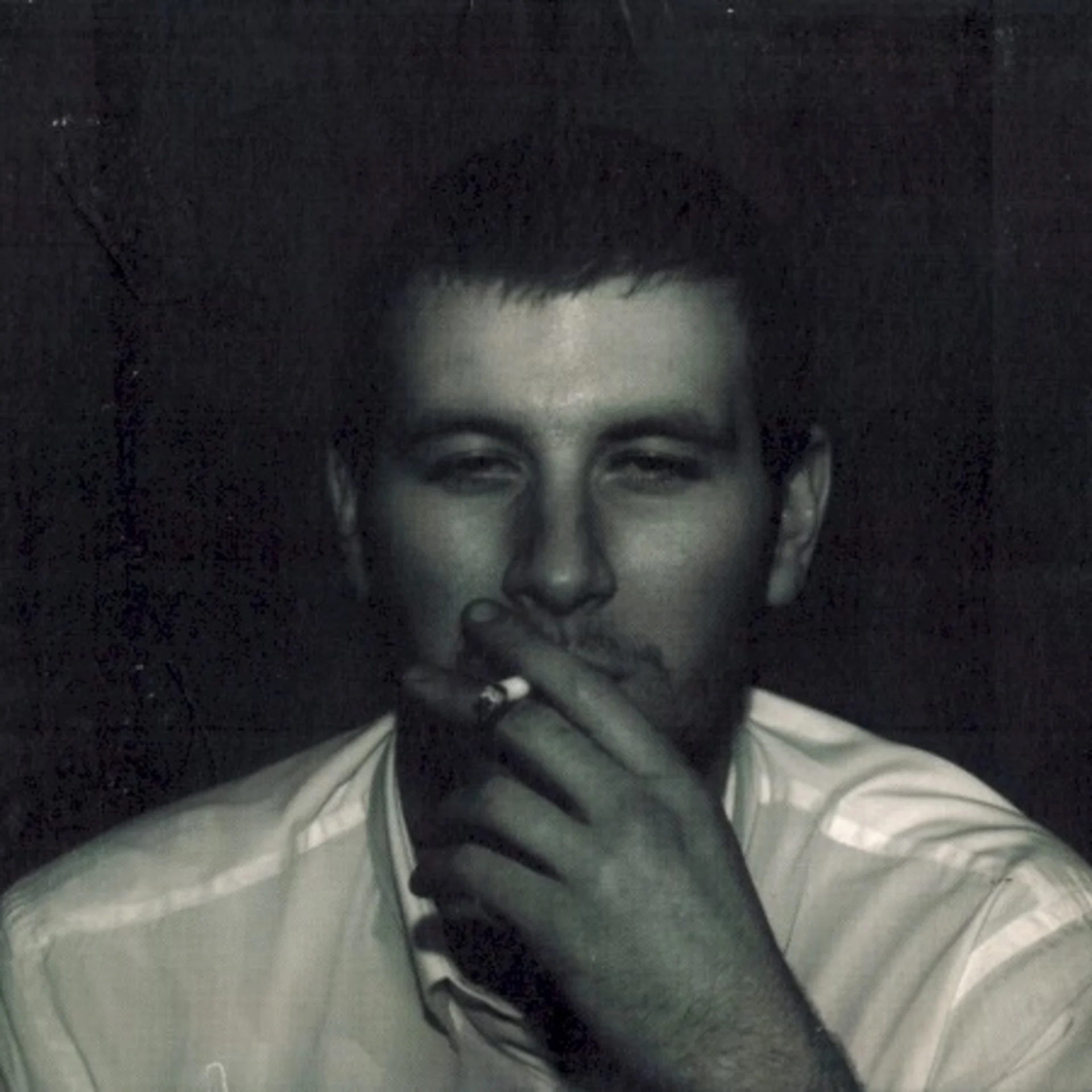 Whatever People Say I Am, That's What I'm Not by Arctic Monkeys — album cover art