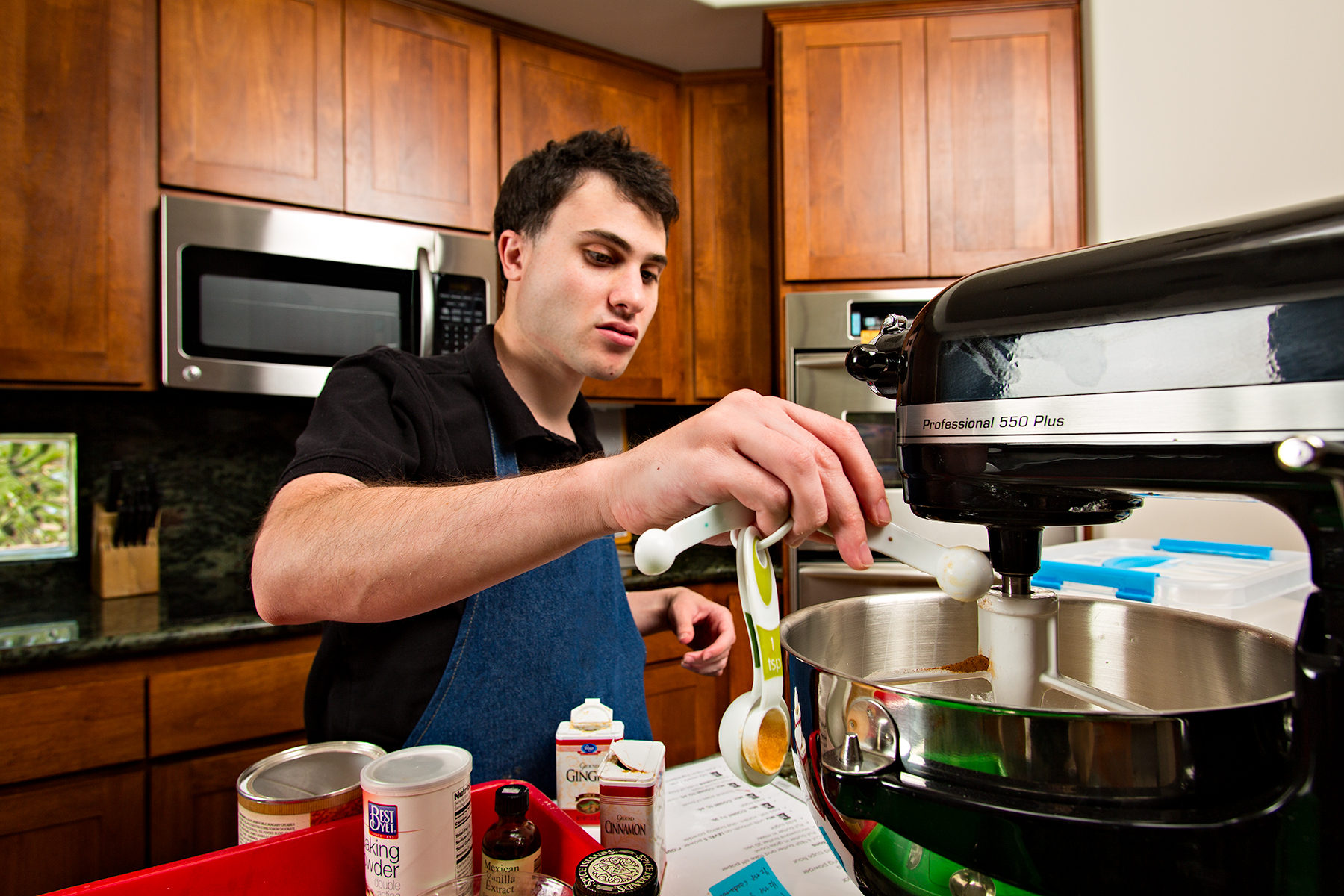 Matt baking biscotti in his home kitchen