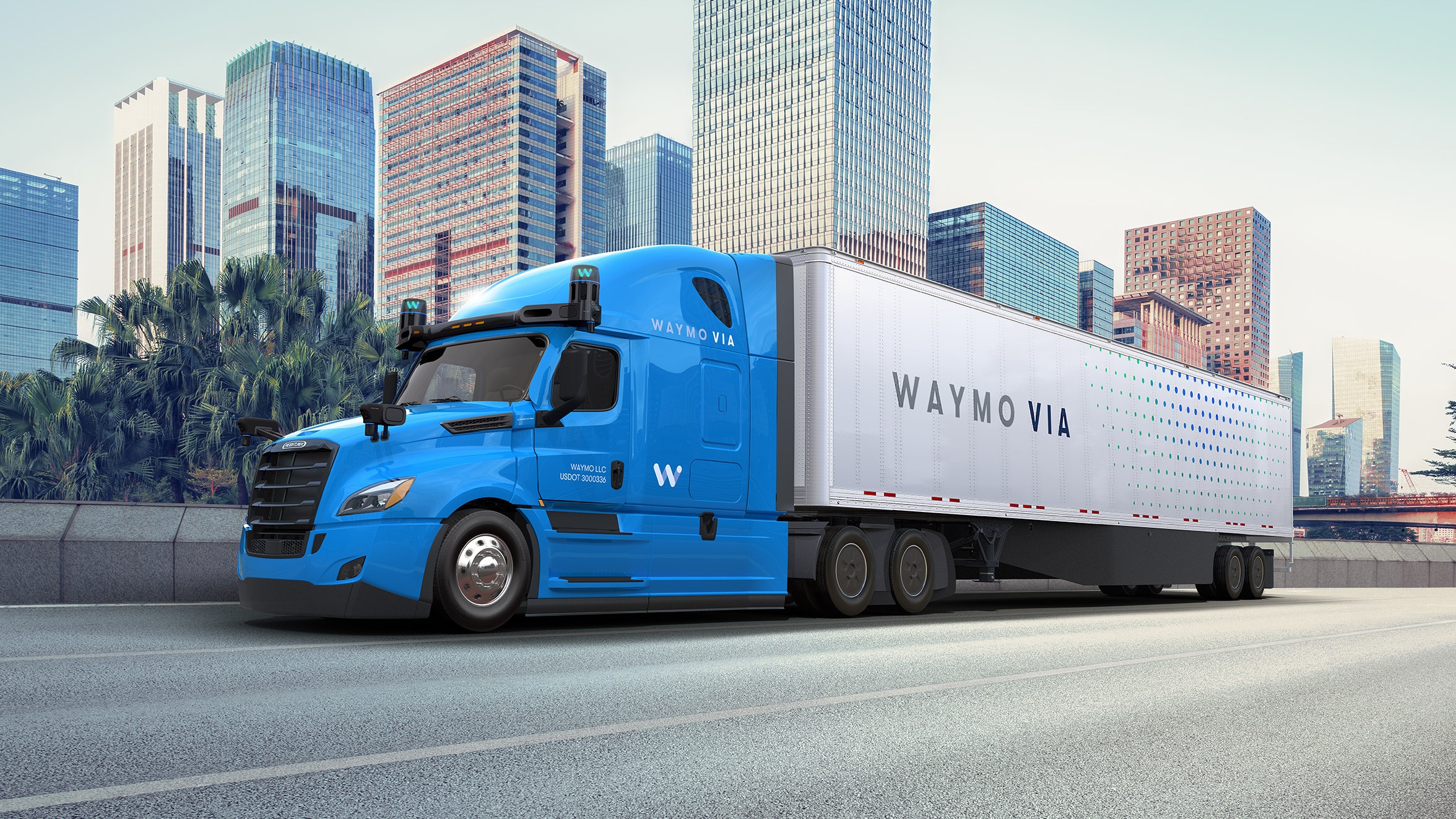 Waymo Via truck driving down a highway