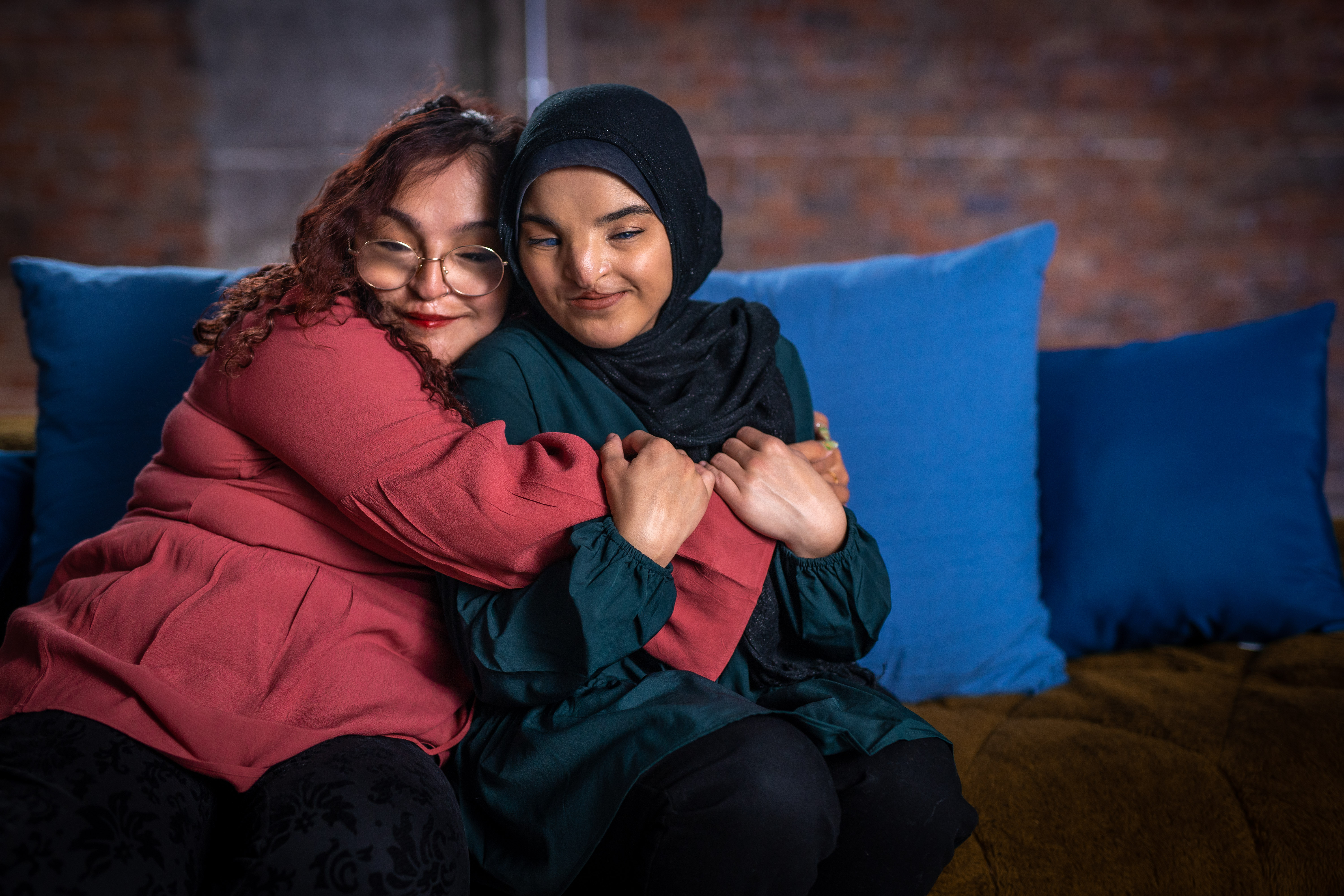 Two women hugging