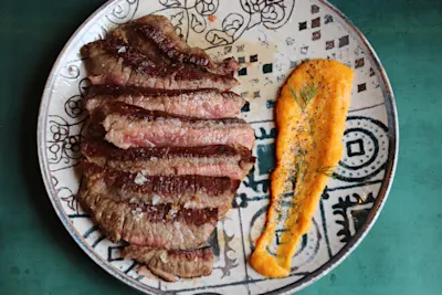 Presa ibérica y calabaza