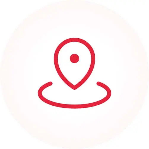 Red location pin icon on white circular background