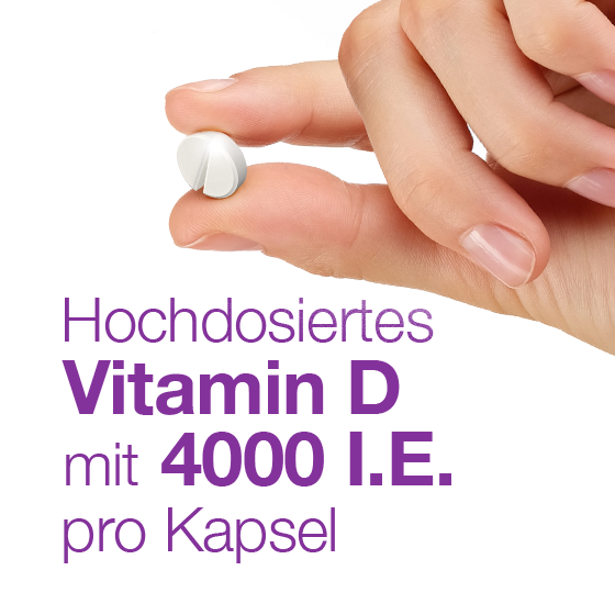 Hand hält eine weiße Kapsel; Text: Hochdosiertes Vitamin D mit 4000 I.E. pro Kapsel.