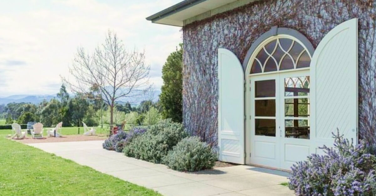 Entrance to the cellar door of Dominique Portet in the Yarra Valley, featuring bistro and vineyard setting.
