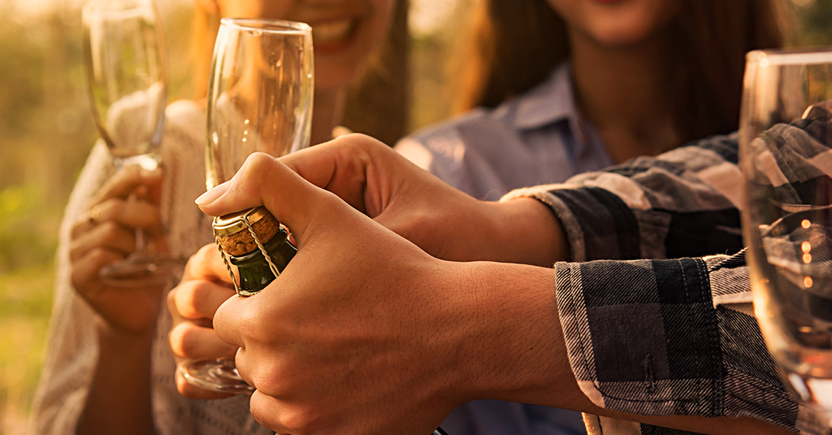 A bottle of champagne being opened.