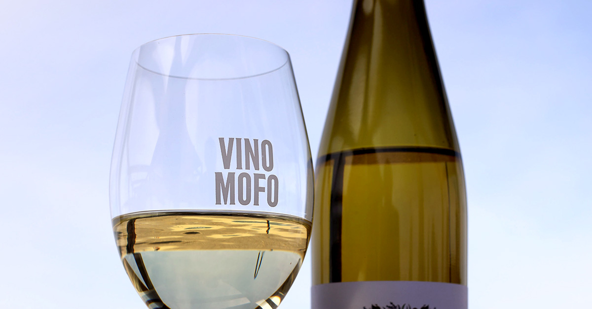 Glass of riesling and a bottle