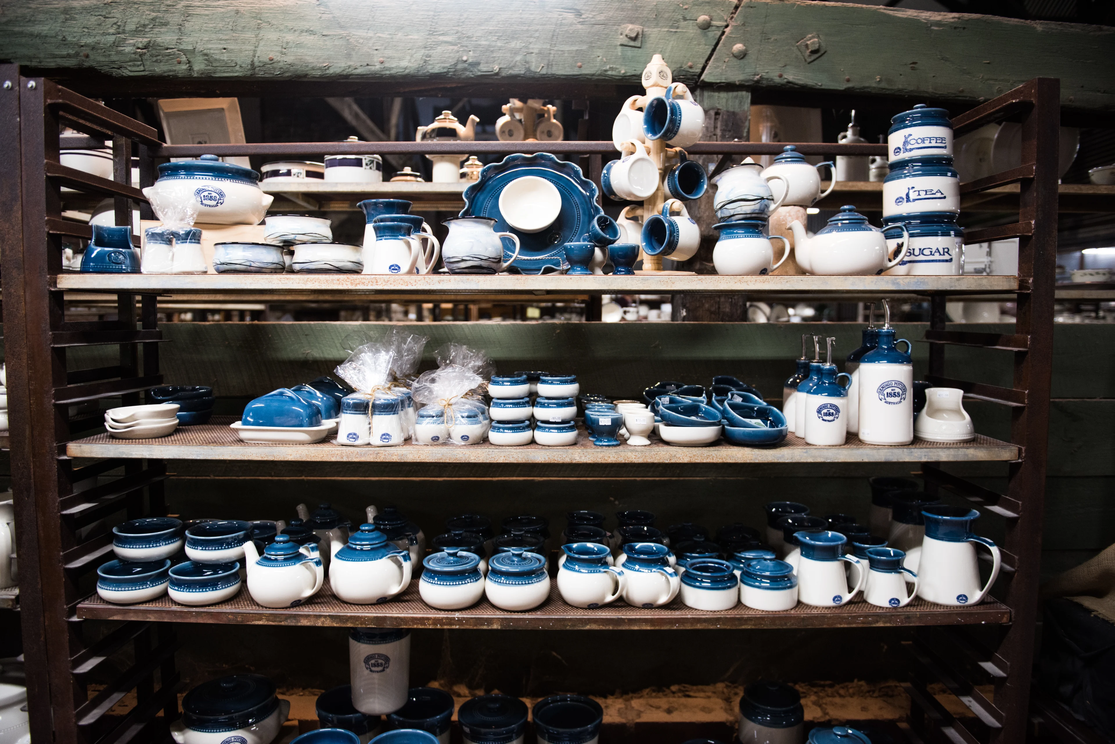 Shelves full of handmade pottery at Bendigo Pottery in Epsom, Bendigo, Victoria.