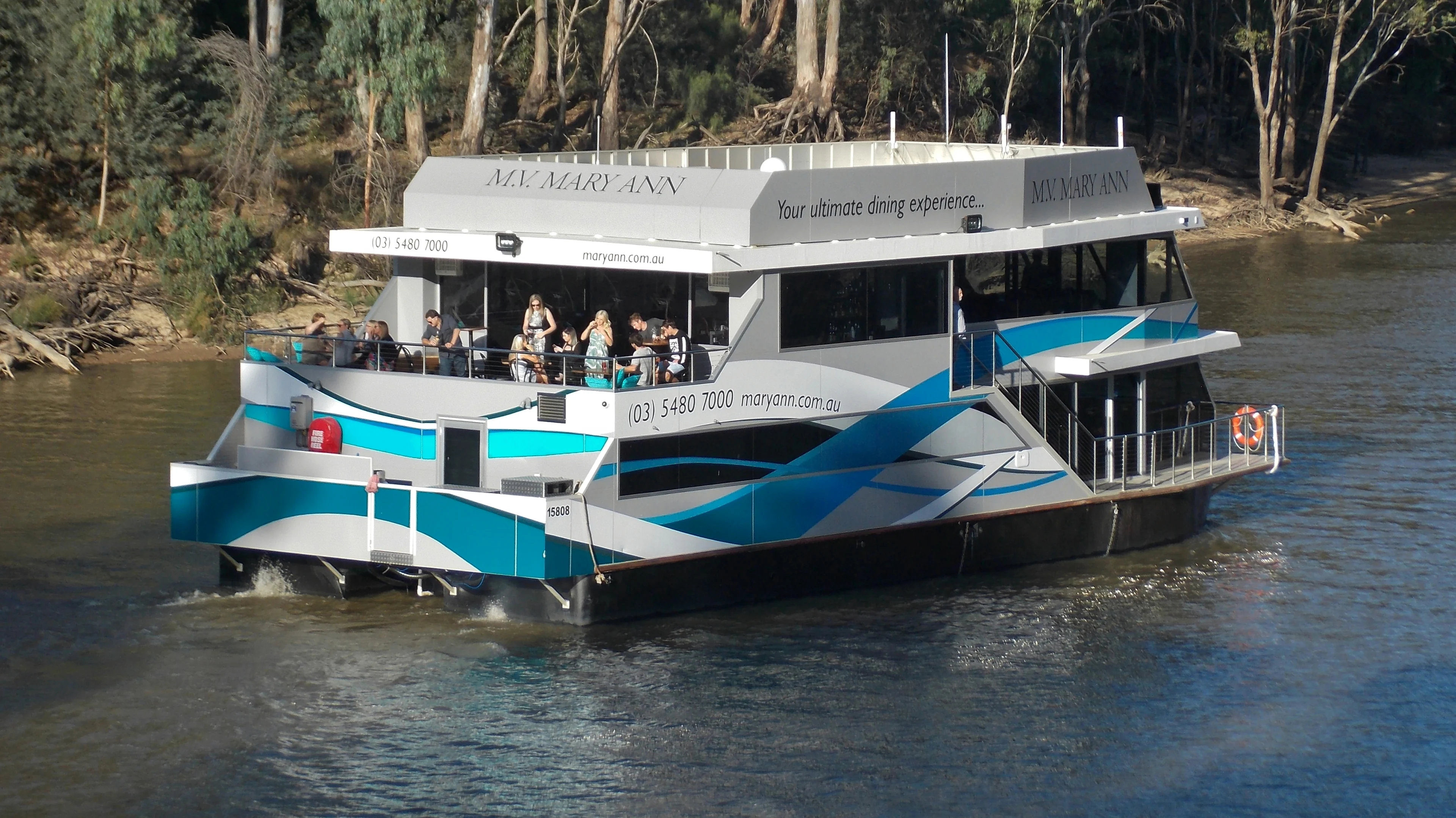 Large modern house-boat style river cruiser on the Murray River, Echuca