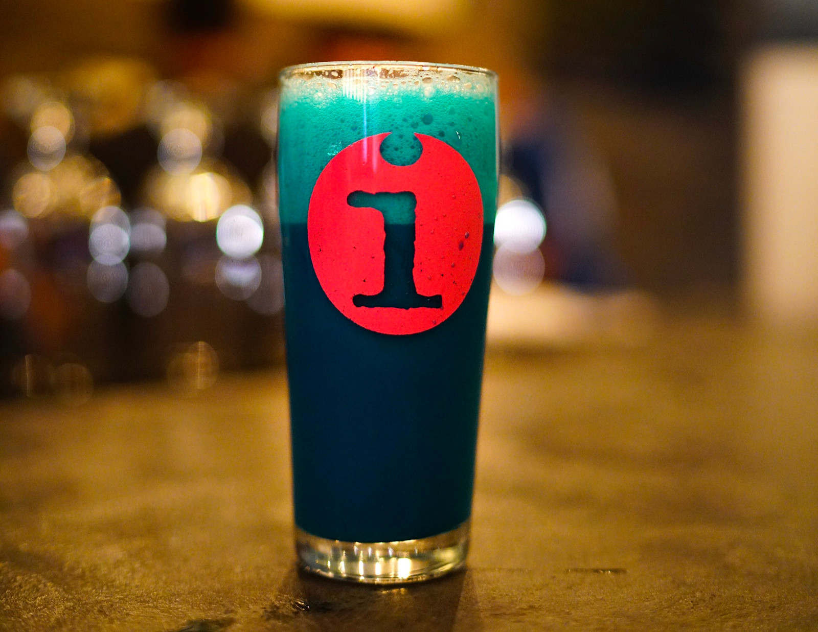 Blue (or Is It Green?) Beer Filled with Little Hugs Primary Image