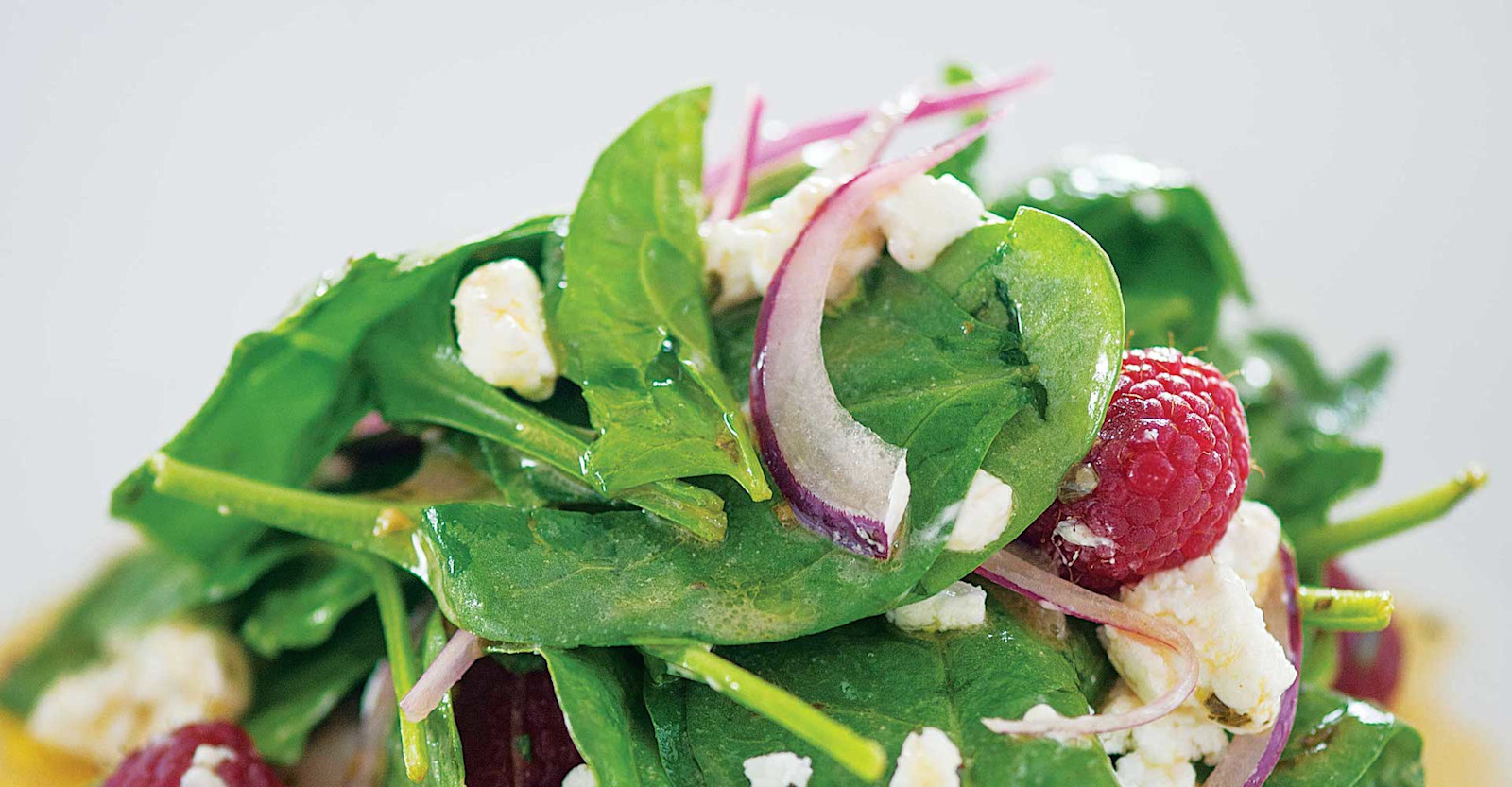 Spinach Salad with Goat Cheese and Raspberry Lambic Dressing Recipe Primary Image
