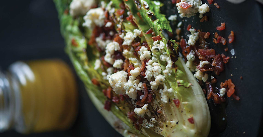 Grilled Romaine Hearts with Bacon, Bleu Cheese, and Citrus Hefeweizen Vinaigrette Recipe Image