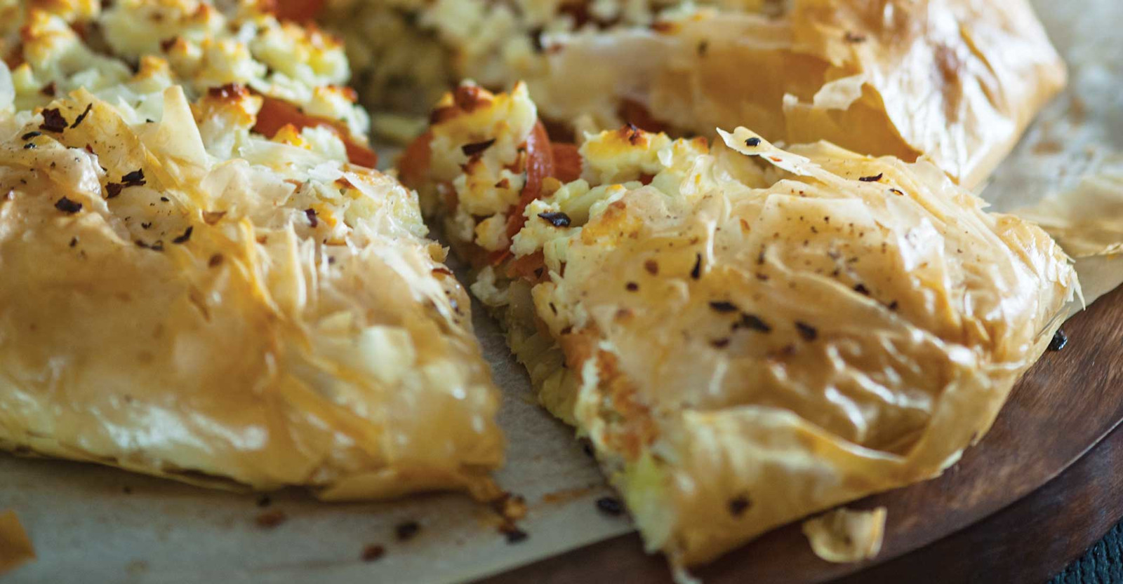 Artichoke, Feta, and Tomato Tart with Summer-Ale Tapenade Recipe Primary Image