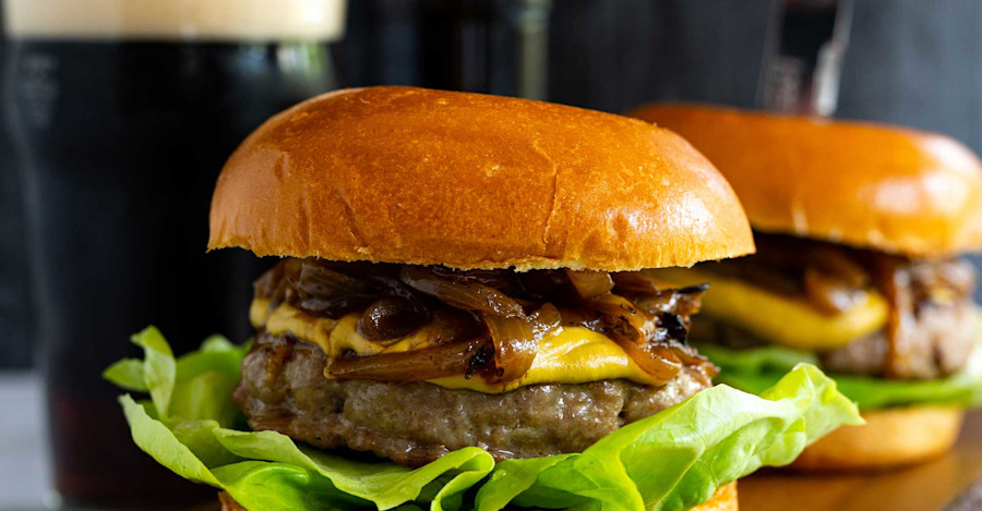 Cooking with Beer: Bratwurst Burger with Ale-Braised Onions & Spicy Mustard Image