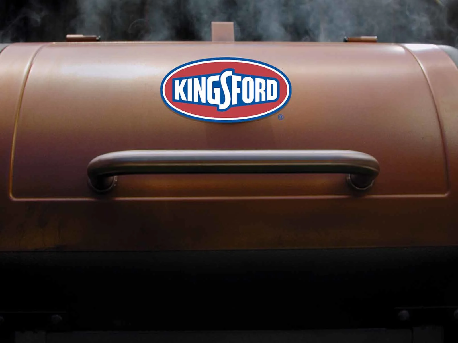View of a closed pellet grill with a Kingsford logo on it