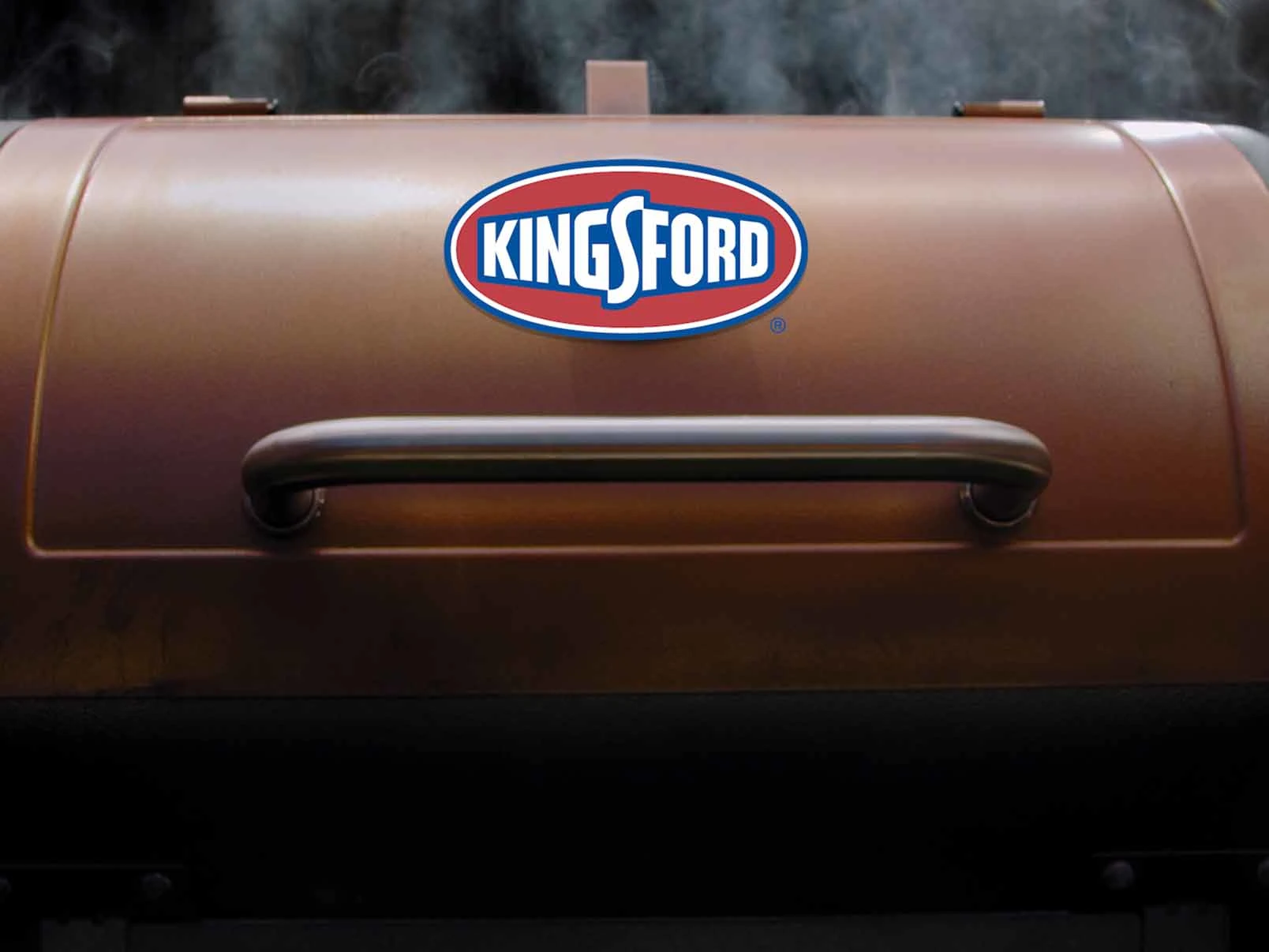 View of a closed pellet grill with a Kingsford logo on it