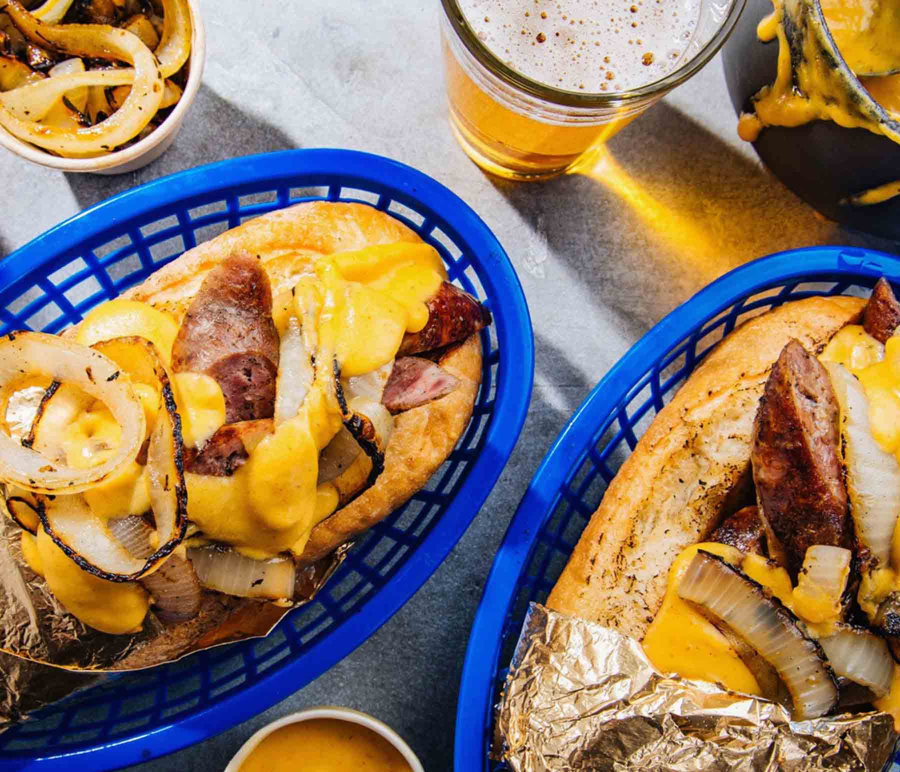 Beer and Cheese Sauced Brats | Kingsford™