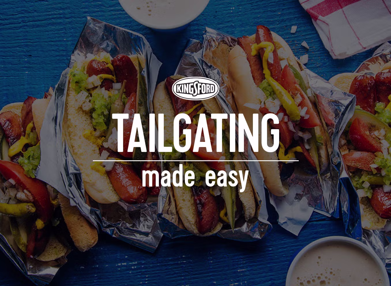 Image of Chicago style hot dogs with a dark overlay, the words "Tailgating Made Easy" on top
