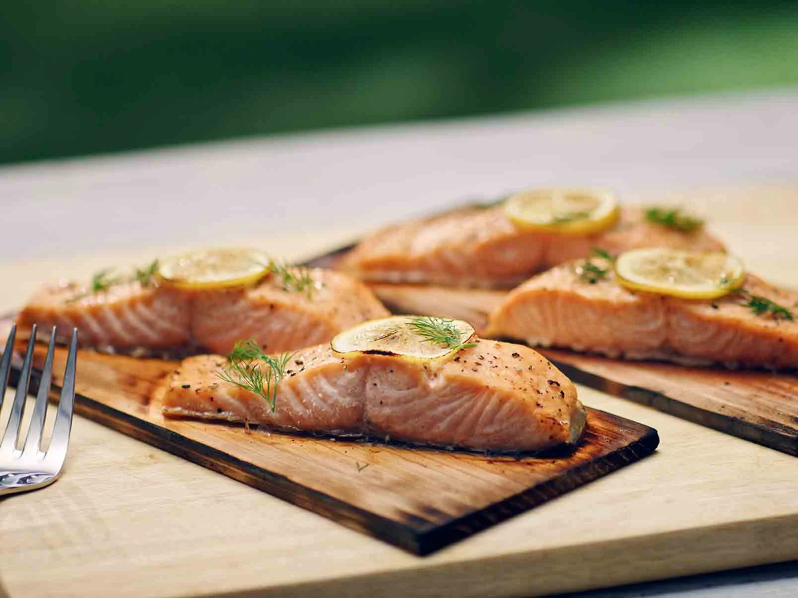 Cooked salmon on cedar planks