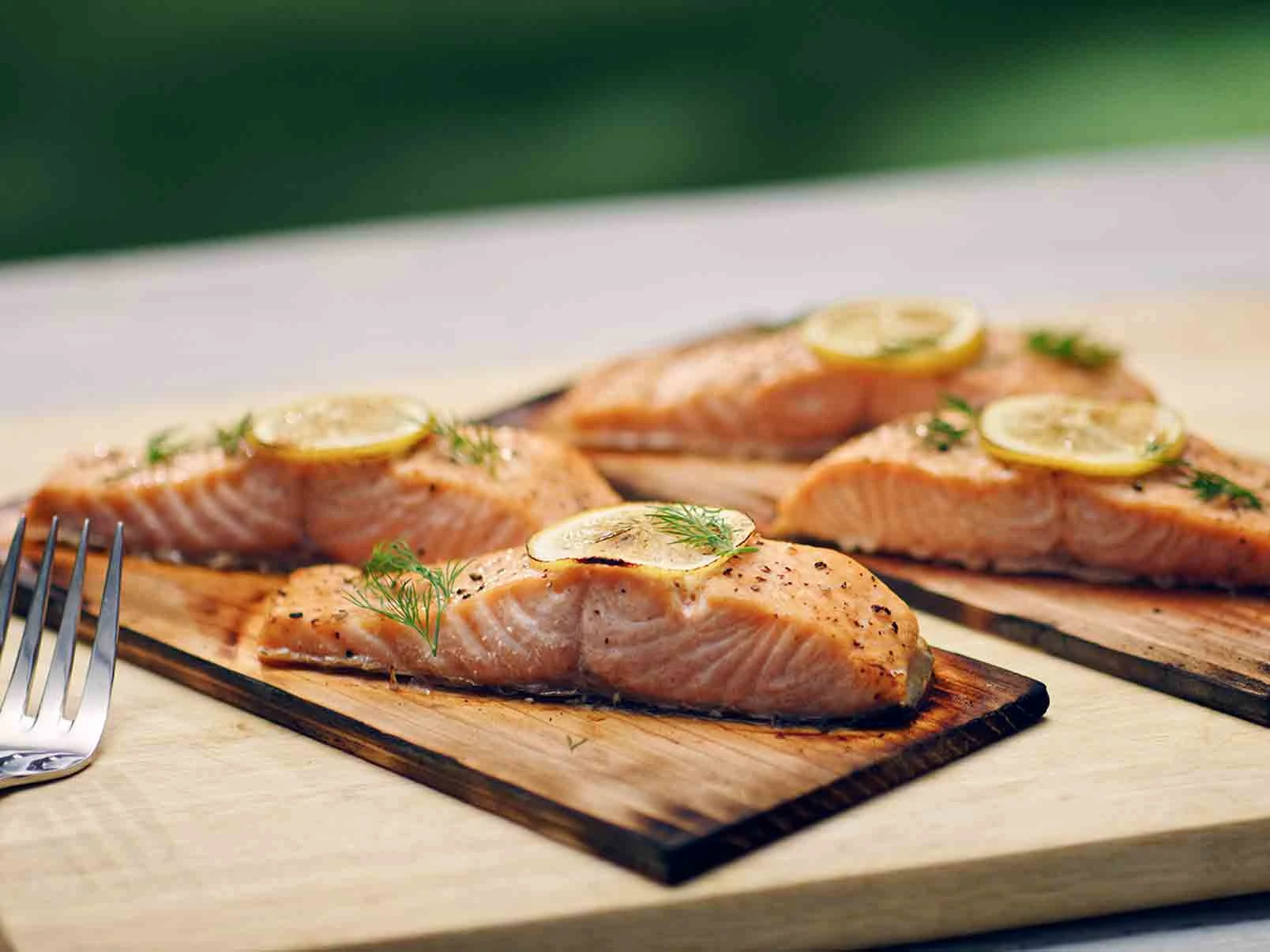 Cooked salmon on cedar planks