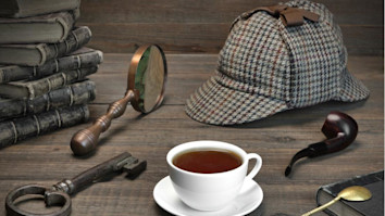 Detective Tools On The Wood Table Background. Deerstalker Cap, Magnifier, Key, Cup, Notebook, Smoking Pipe
