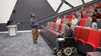 University lecture hall with student in wheelchair