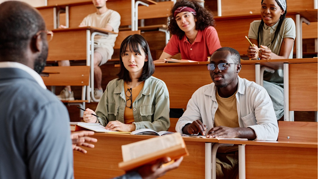 A lecturer giving a speech to a class