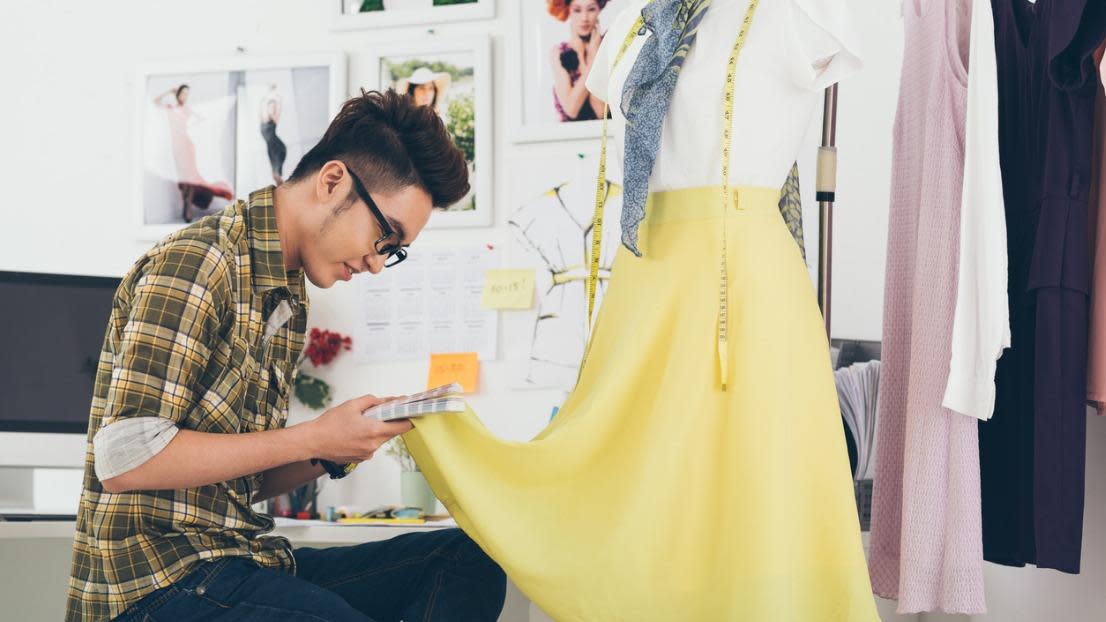Student looking at colour dress