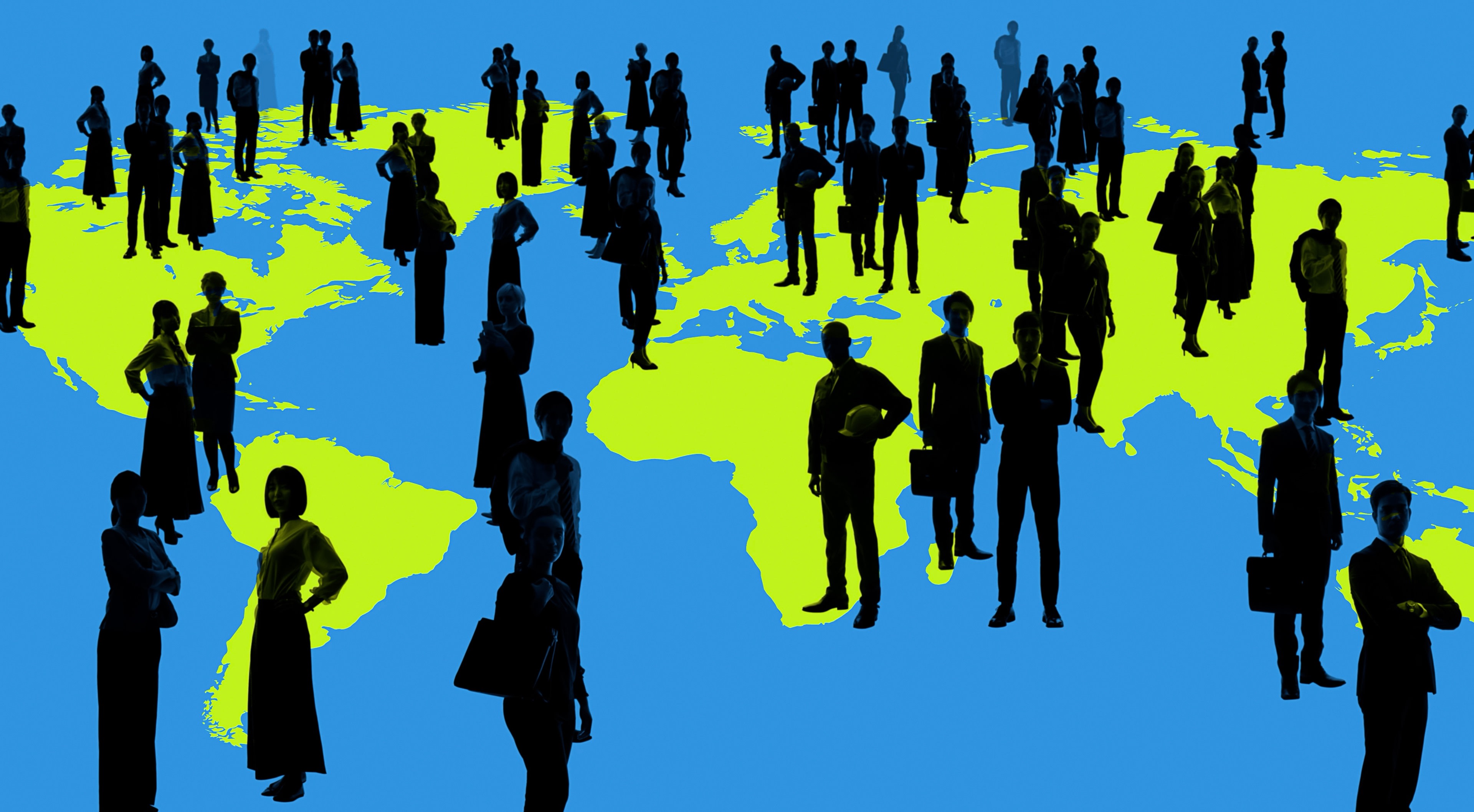 Many silhouetted workers stand all over a map of the world
