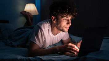 Male student applyinf to uni late at night - iStock - How to make a last-minute UCAS application