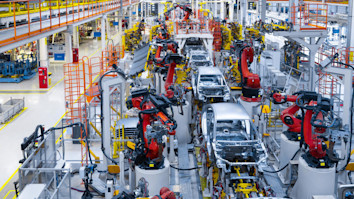 Automotive production line. Welding car body. Modern car Assembly plant