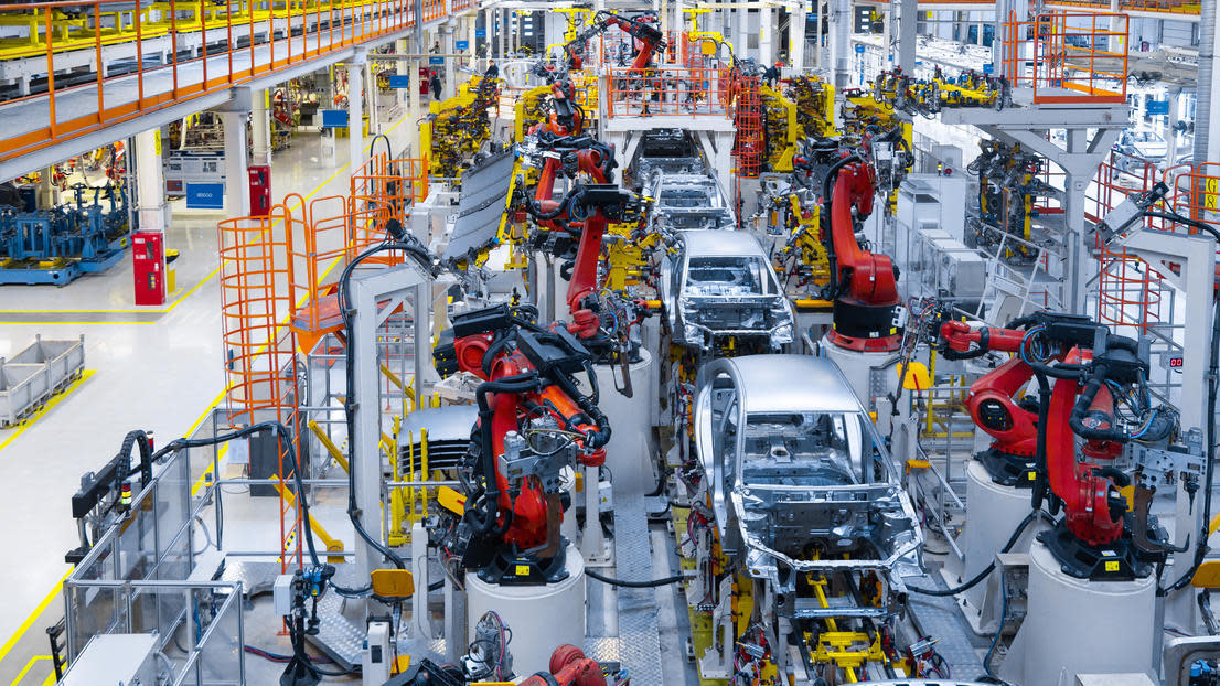 Automotive production line. Welding car body. Modern car Assembly plant